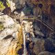 view-at-waterfall-path-along-mountain-stream-touri-potrait-1.jpg